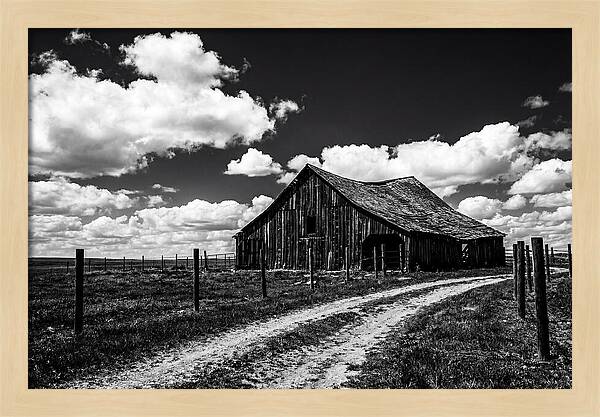Red Barn Under Dramatic Skies