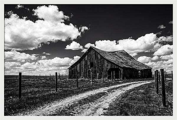Red Barn Under Dramatic Skies