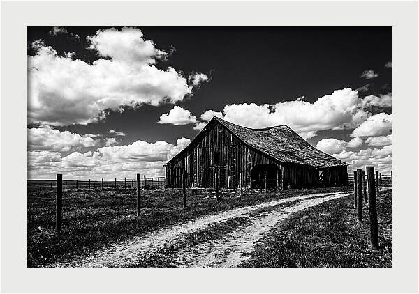 Red Barn Under Dramatic Skies