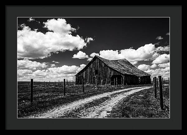 Red Barn Under Dramatic Skies