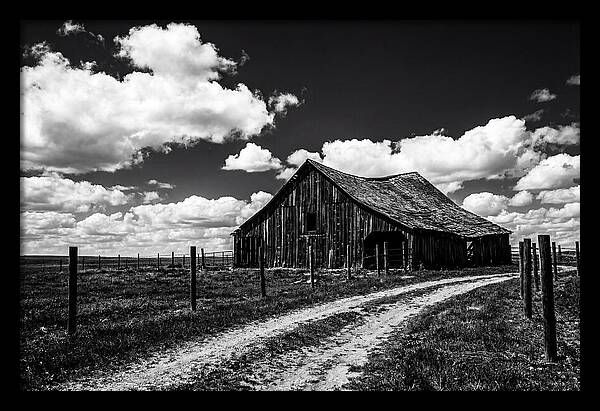 Red Barn Under Dramatic Skies