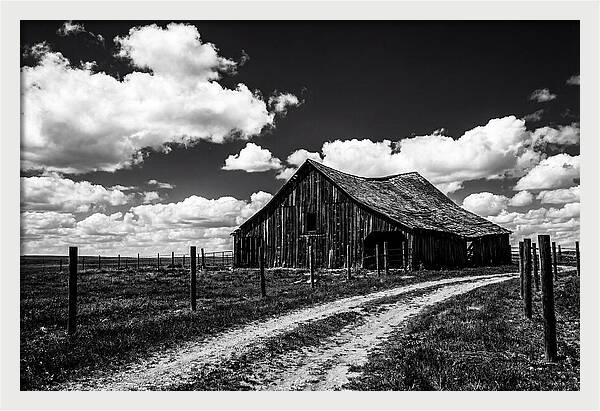Red Barn Under Dramatic Skies