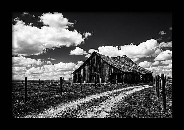 Red Barn Under Dramatic Skies