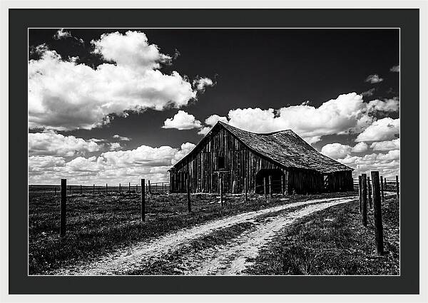 Red Barn Under Dramatic Skies