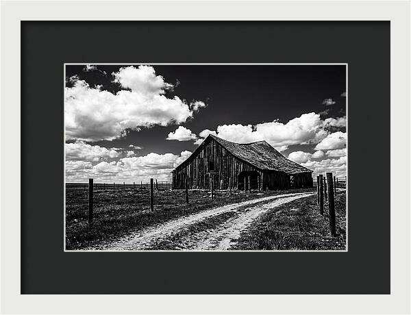 Red Barn Under Dramatic Skies