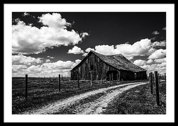 Red Barn Under Dramatic Skies