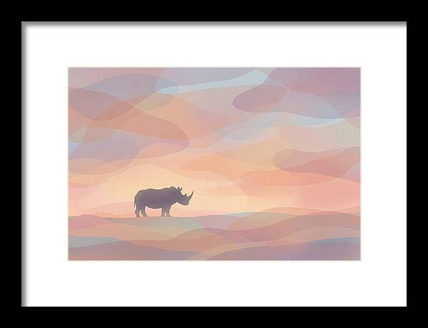 Rhino Silhouette Against Orange Sky