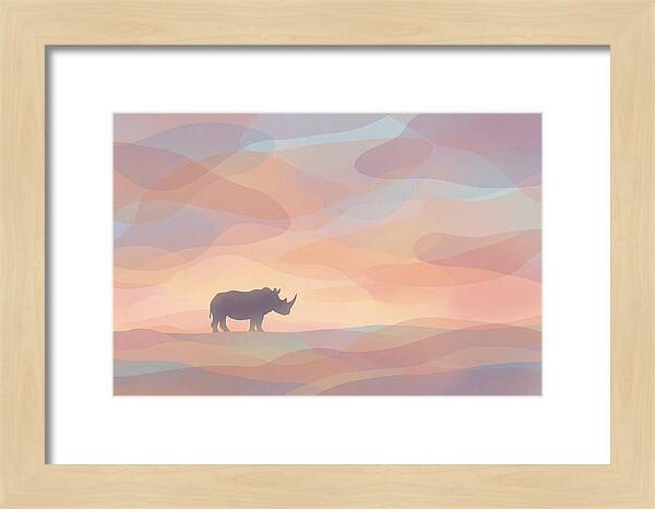 Rhino Silhouette Against Orange Sky