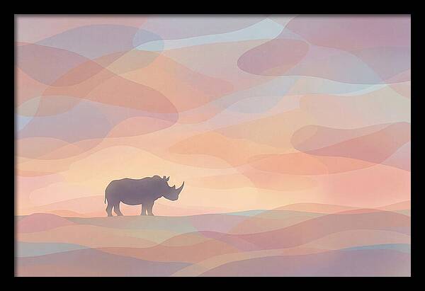 Rhino Silhouette Against Orange Sky