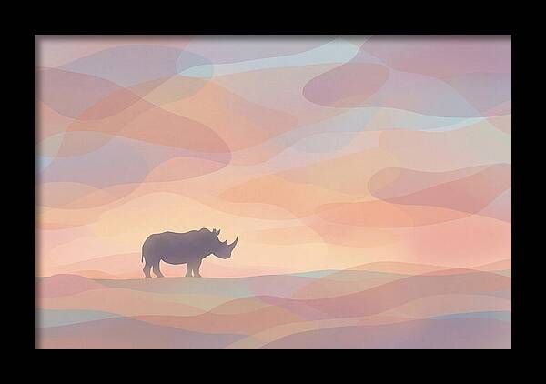 Rhino Silhouette Against Orange Sky