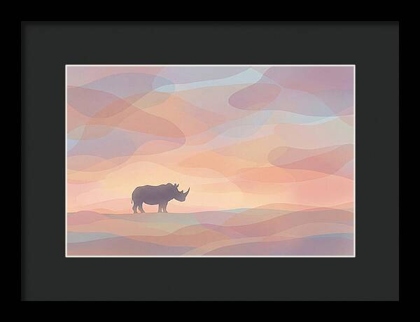 Rhino Silhouette Against Orange Sky