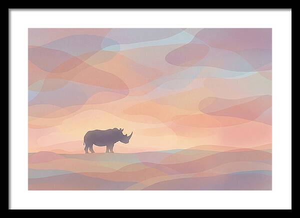 Rhino Silhouette Against Orange Sky