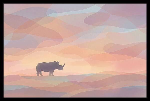 Rhino Silhouette Against Orange Sky