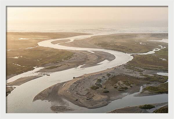 River Meets Sea At Wide Sandy Delta