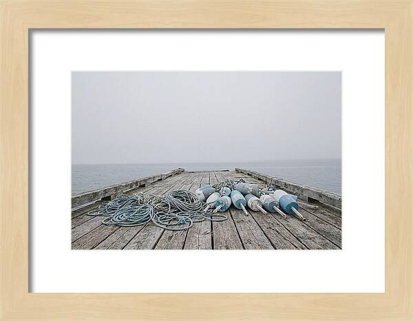 Rope And Lobster Buoys On Dock