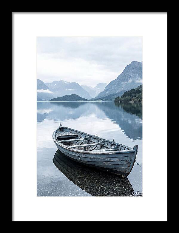 Rowboat On Peaceful Water