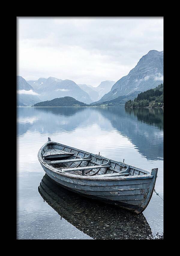 Rowboat On Peaceful Water