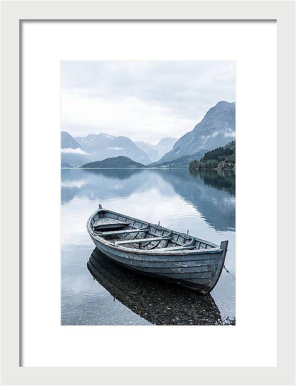 Rowboat On Peaceful Water