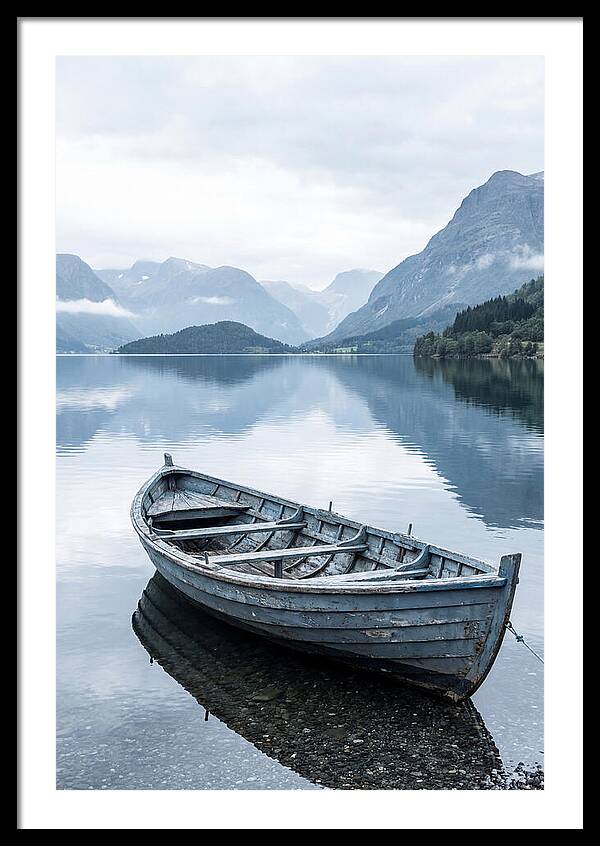Rowboat On Peaceful Water