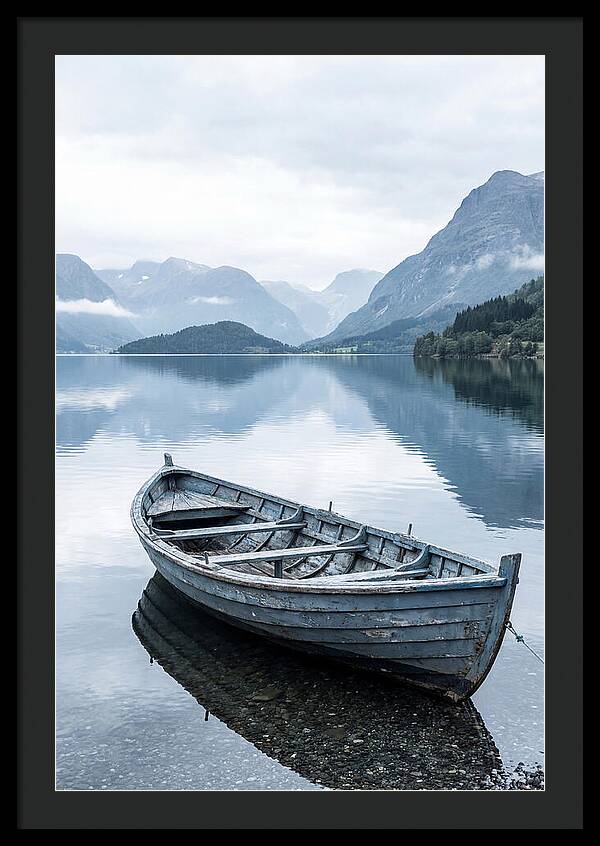 Rowboat On Peaceful Water