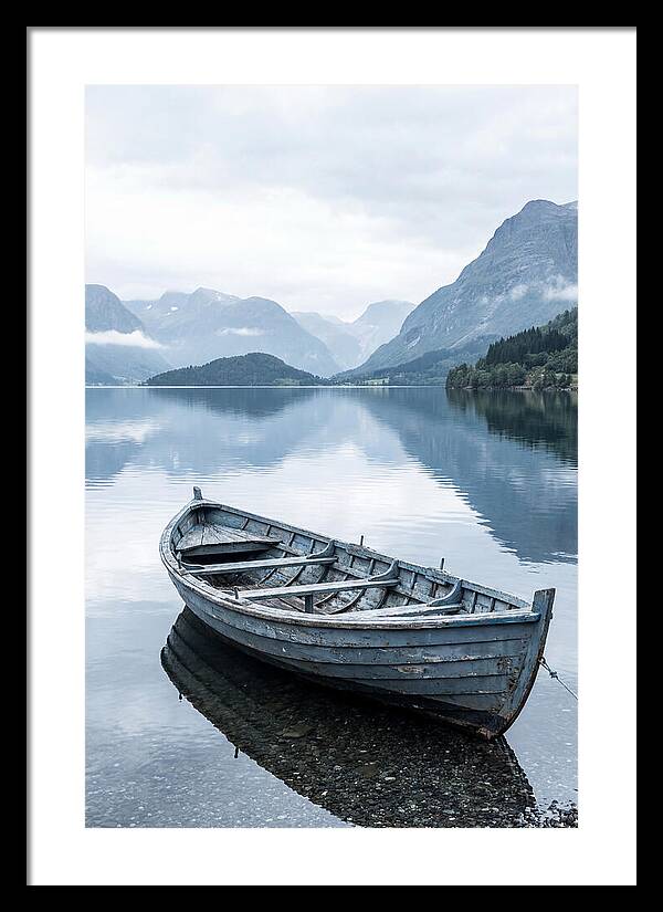 Rowboat On Peaceful Water
