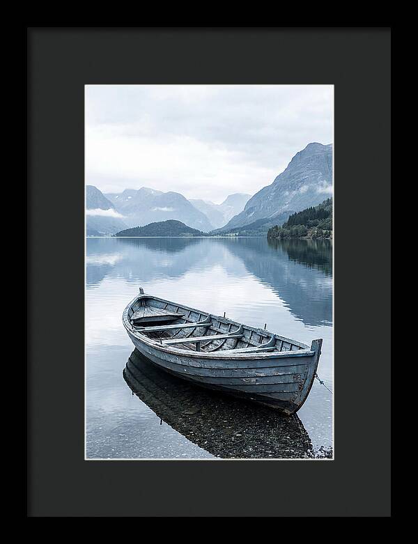 Rowboat On Peaceful Water