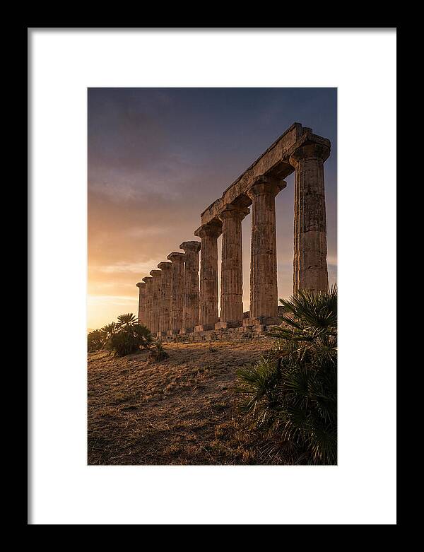 Ruins Of Ancient Columns At Sunset