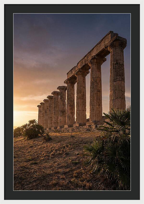 Ruins Of Ancient Columns At Sunset
