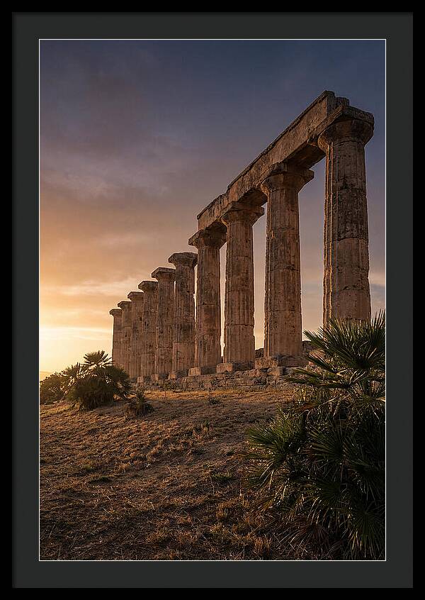 Ruins Of Ancient Columns At Sunset