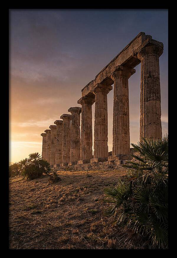 Ruins Of Ancient Columns At Sunset