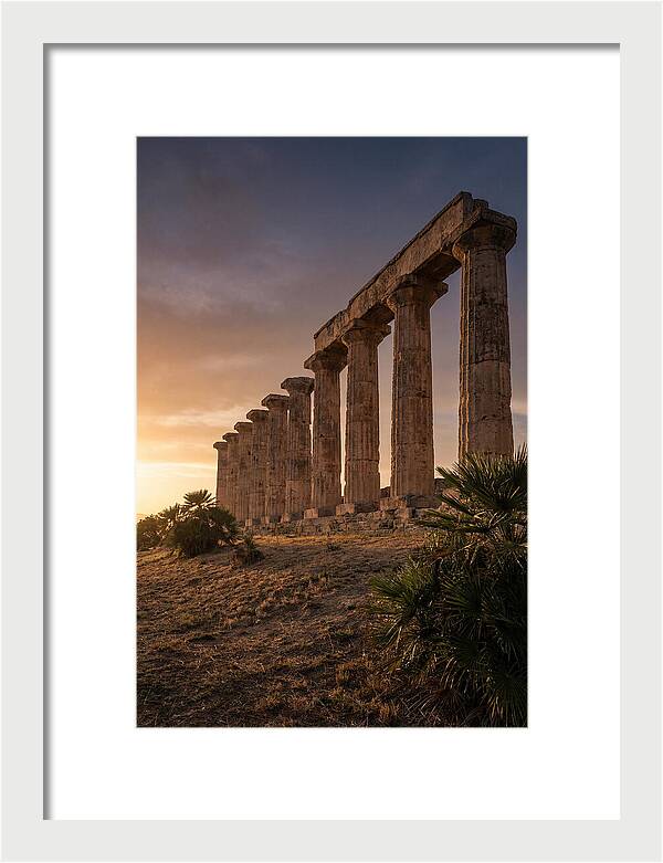 Ruins Of Ancient Columns At Sunset