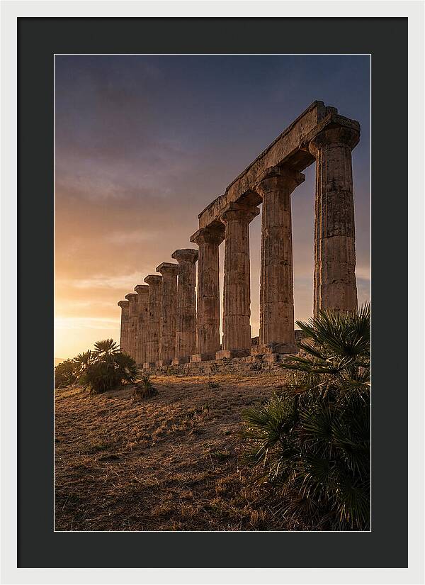 Ruins Of Ancient Columns At Sunset