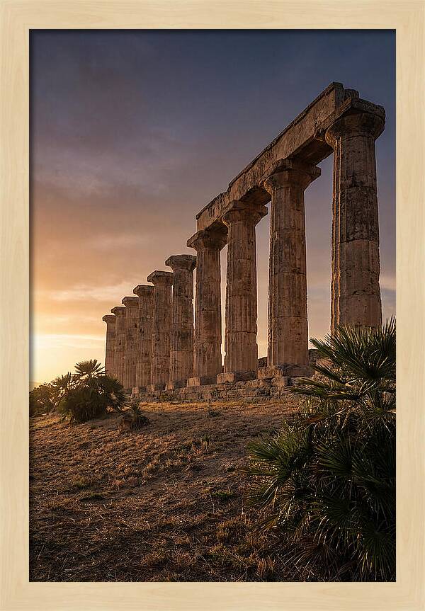 Ruins Of Ancient Columns At Sunset
