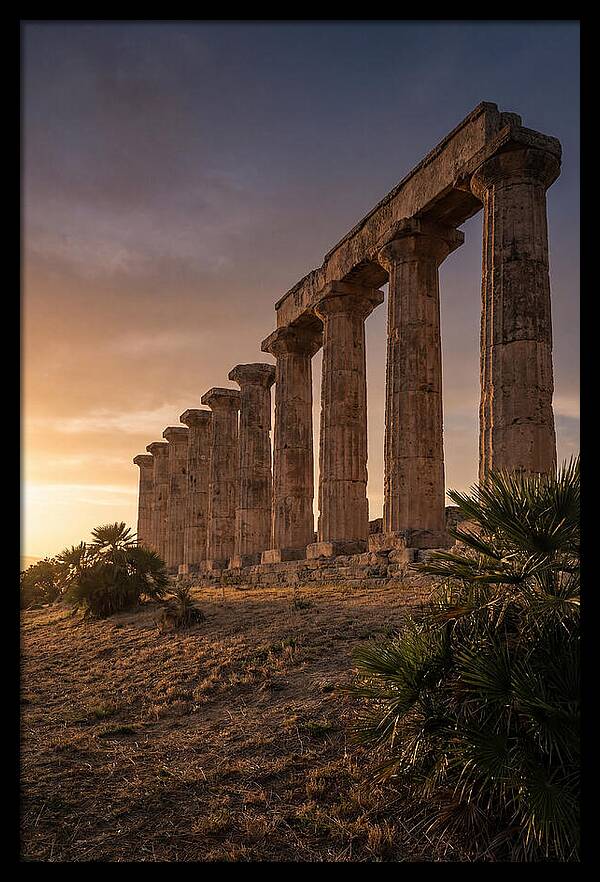 Ruins Of Ancient Columns At Sunset
