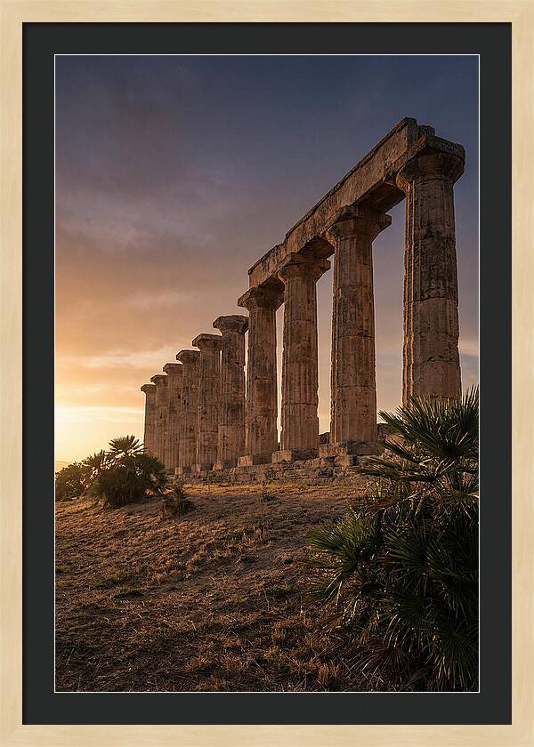 Ruins Of Ancient Columns At Sunset