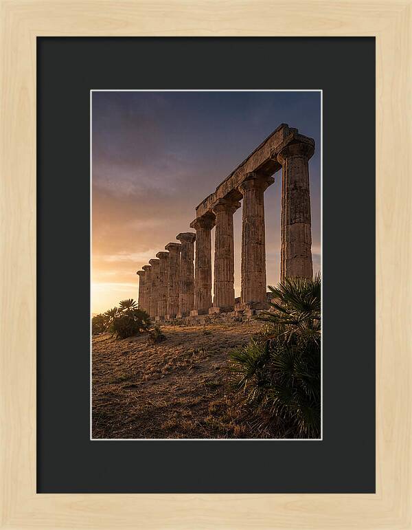 Ruins Of Ancient Columns At Sunset