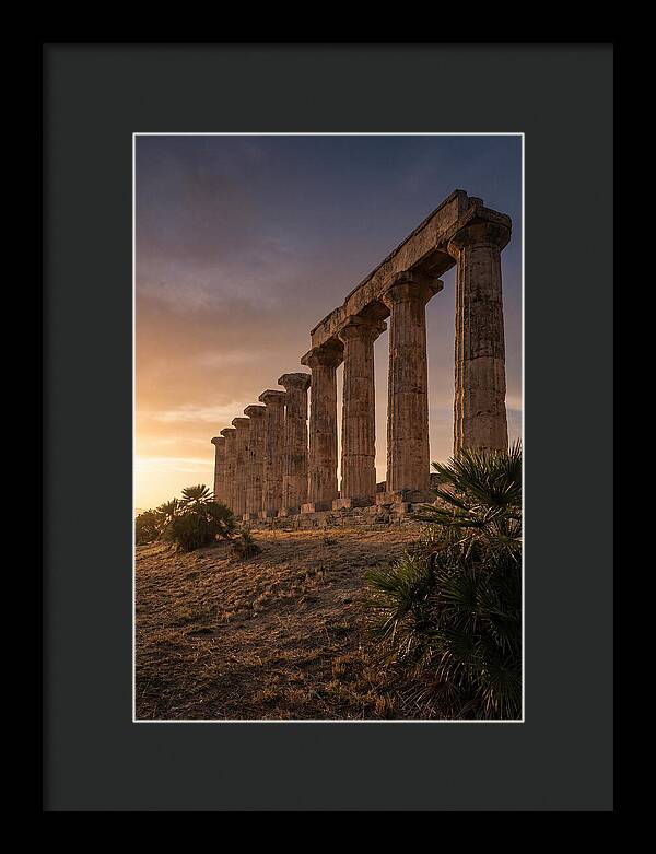 Ruins Of Ancient Columns At Sunset
