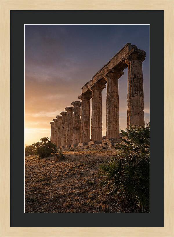 Ruins Of Ancient Columns At Sunset