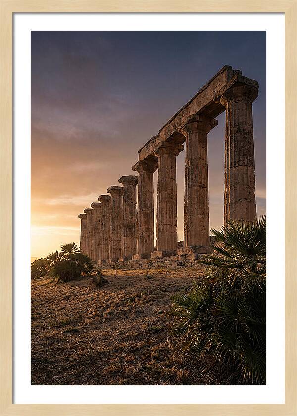 Ruins Of Ancient Columns At Sunset