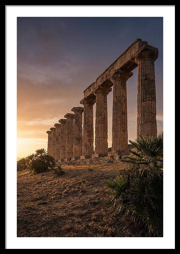 Ruins Of Ancient Columns At Sunset