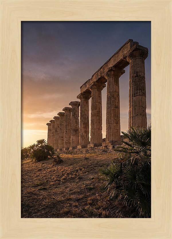 Ruins Of Ancient Columns At Sunset
