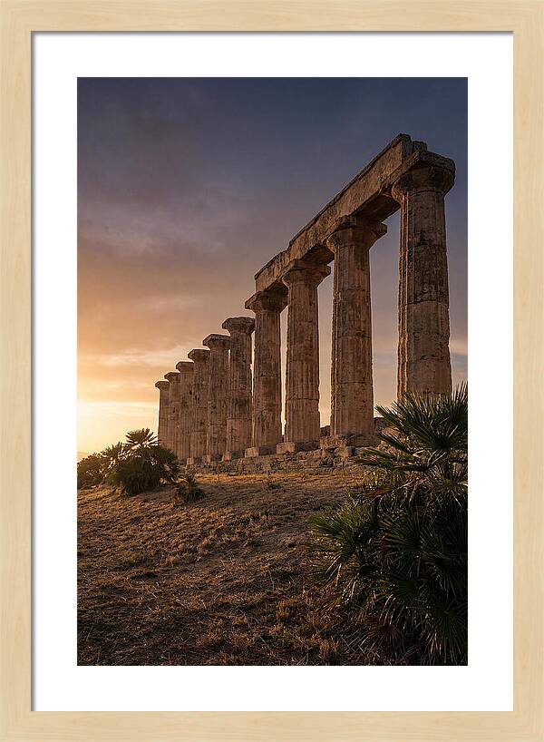 Ruins Of Ancient Columns At Sunset