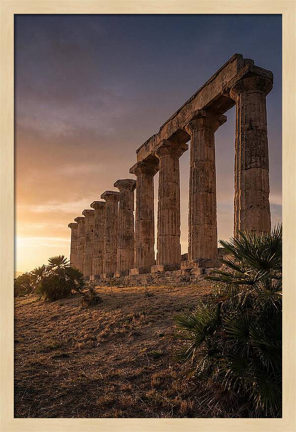 Ruins Of Ancient Columns At Sunset