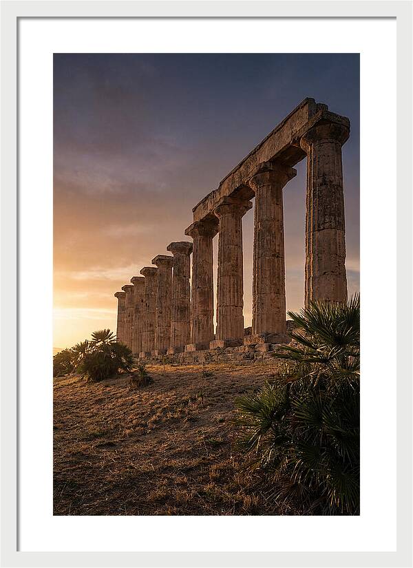 Ruins Of Ancient Columns At Sunset