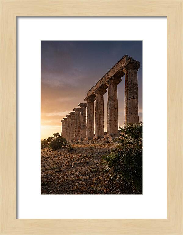 Ruins Of Ancient Columns At Sunset