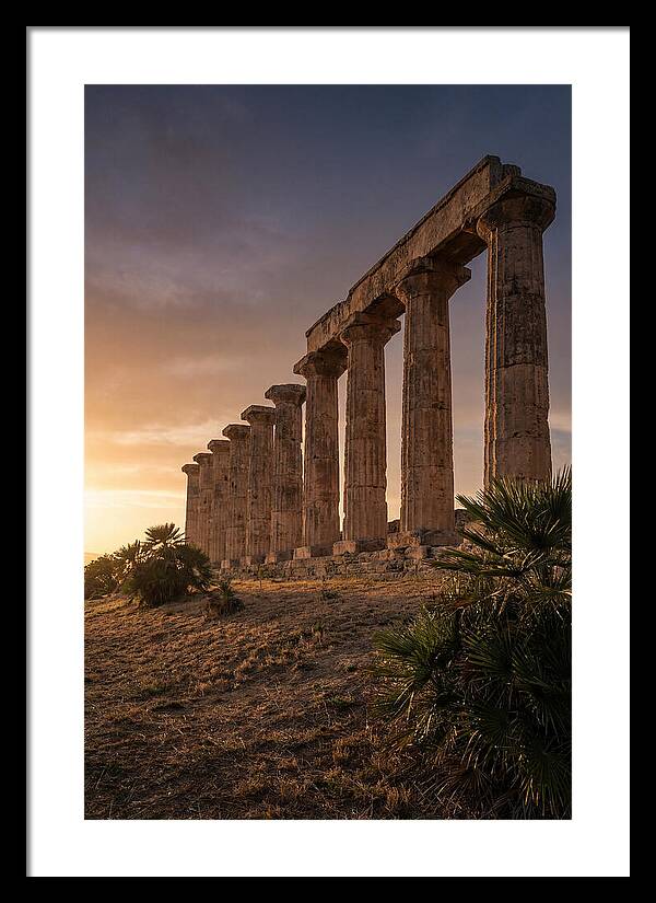 Ruins Of Ancient Columns At Sunset