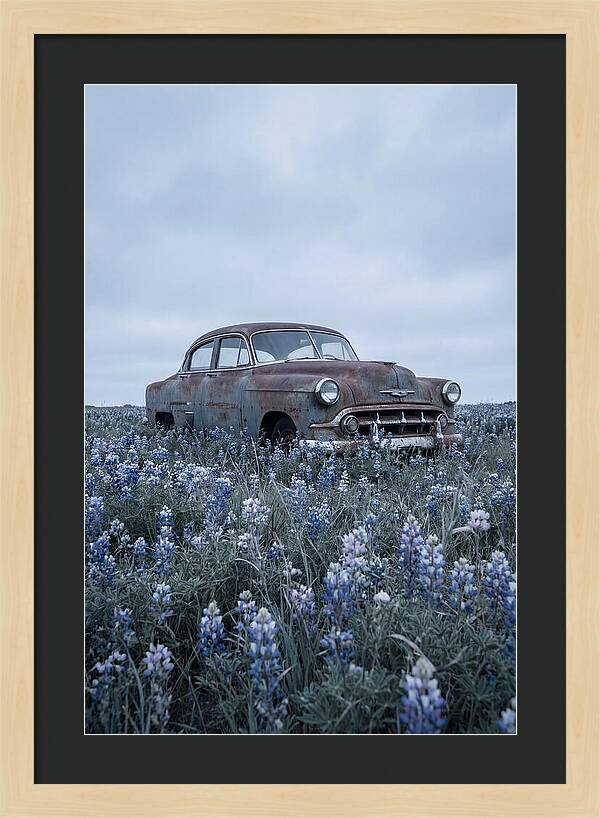 Rusted Classic Car Among Wildflowers