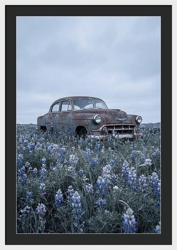 Rusted Classic Car Among Wildflowers
