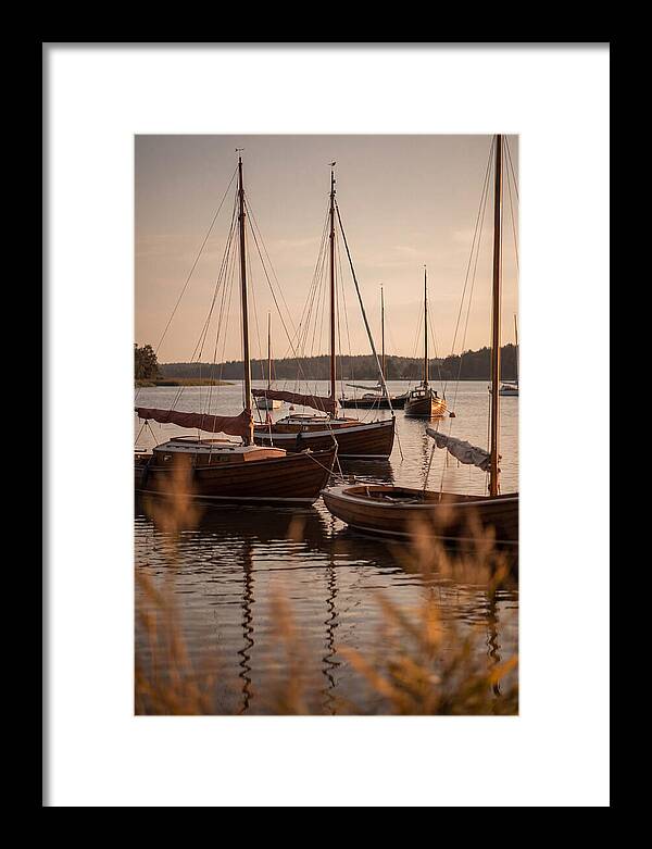 Sailboats Anchored In Tranquil Waters