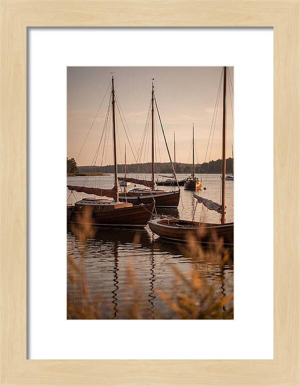 Sailboats Anchored In Tranquil Waters